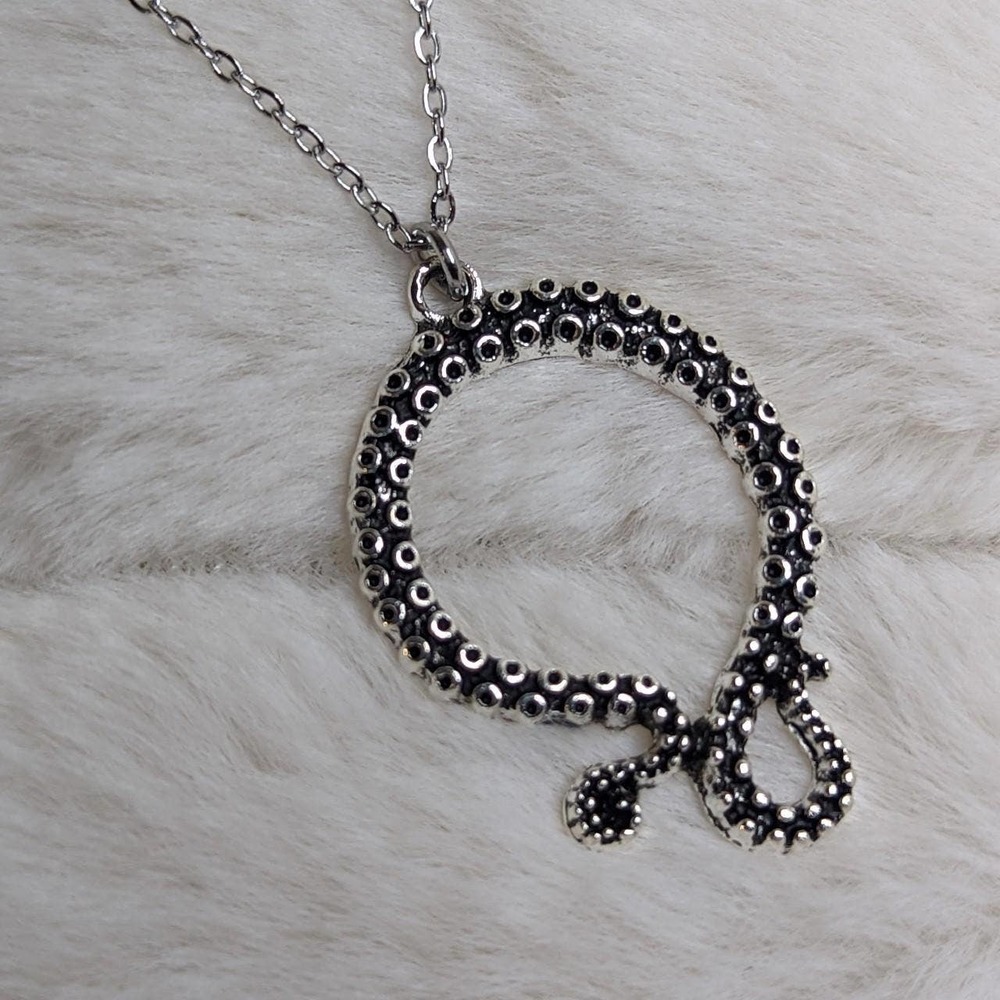 Octopus tentacle charm necklace